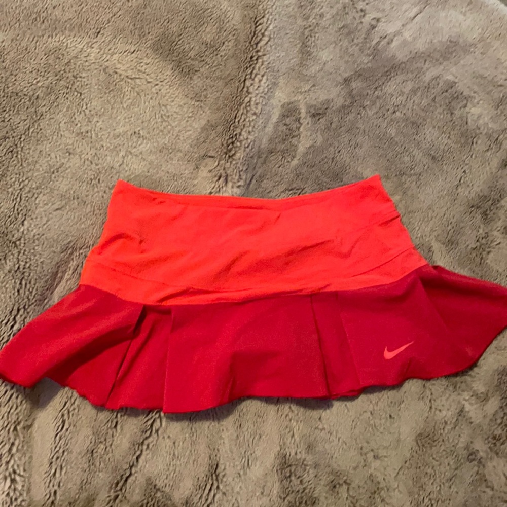 Red tennis skirt